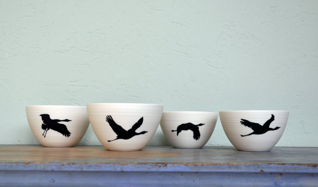 Turned porcelain bowls, cranes